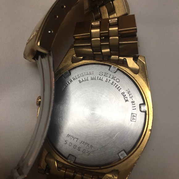 titan world time watch